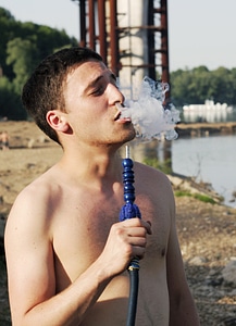 Man smoking a pipe photo