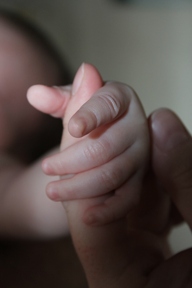 Kid mother hand
