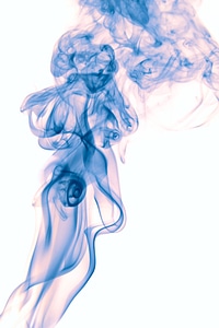 Blue smoke on white photo