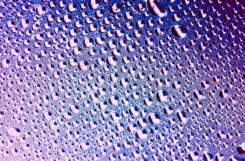 Blue and Violet Water Drops Background