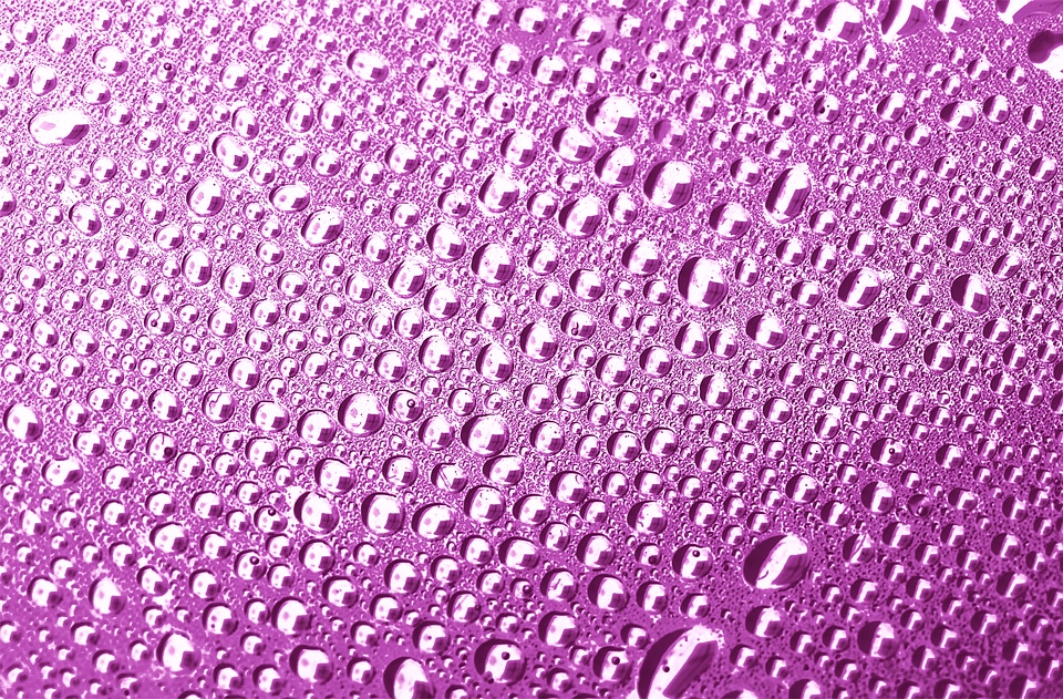 Pink water drops background