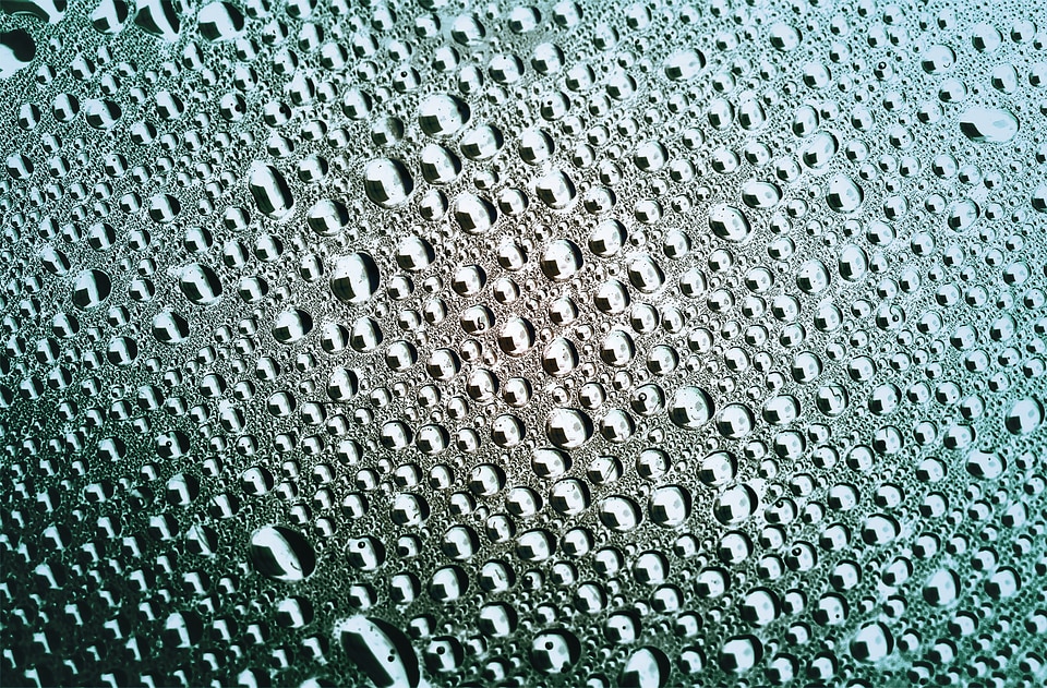 Green water drops background