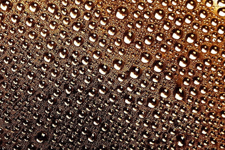 Abstract orange water drops background