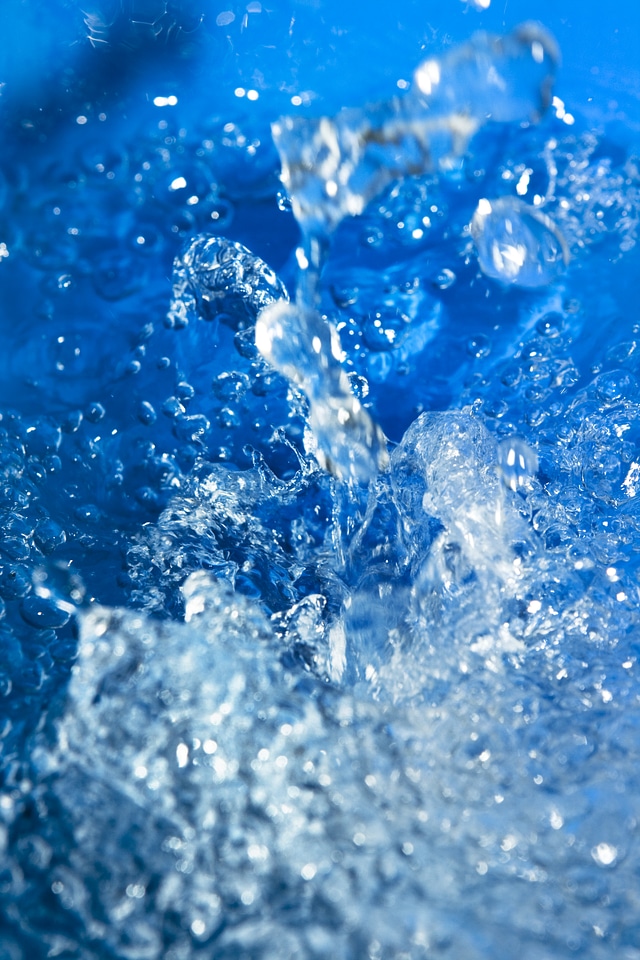 Splashing blue water
