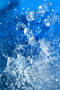 Splashing blue water photo