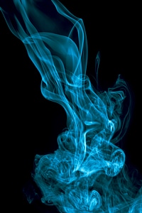 Abstract waves of blue smoke