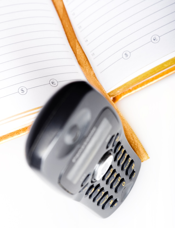 Telephone and notebook