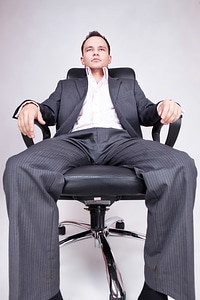 Businessman Sitting in Chair photo