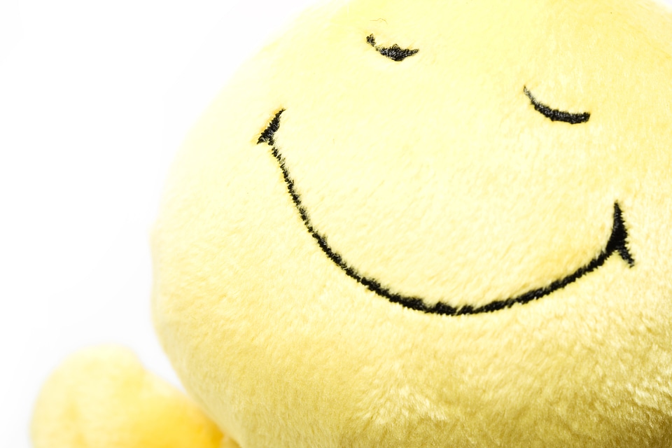 Smiling yellow toy