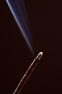 Smoke from incense stick photo