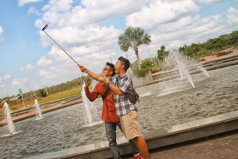 Guys taking selfie