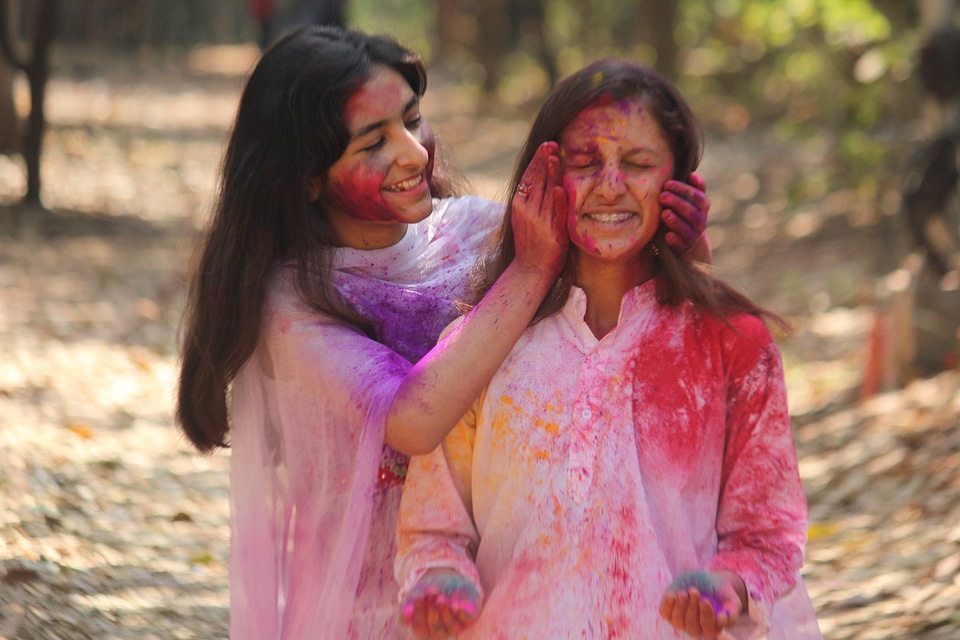 Girls Playing With Colored Powder