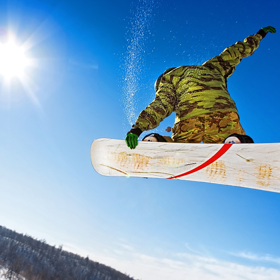 Snowboarder jumping