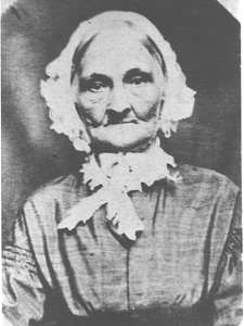 Vintage old woman with cap photo