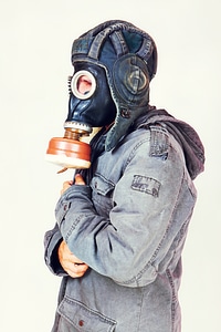 Man with gas mask photo