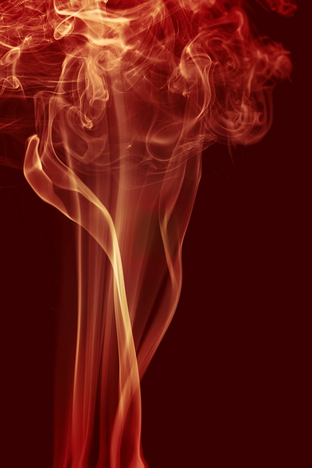 Red abstract swirly smoke
