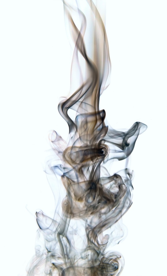 Black smoke on white background photo