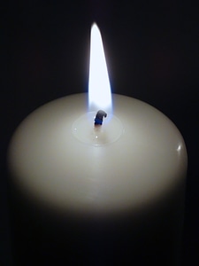 Candle flame light dark photo