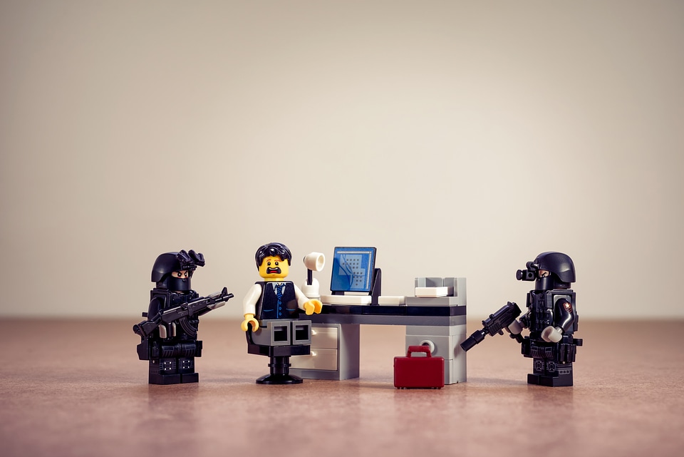 Police in the office. Business concept photo