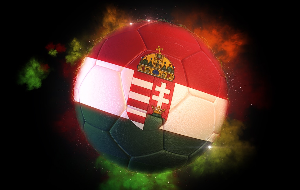 Soccer ball textured with flag of Hungary with Coat Of Arms photo