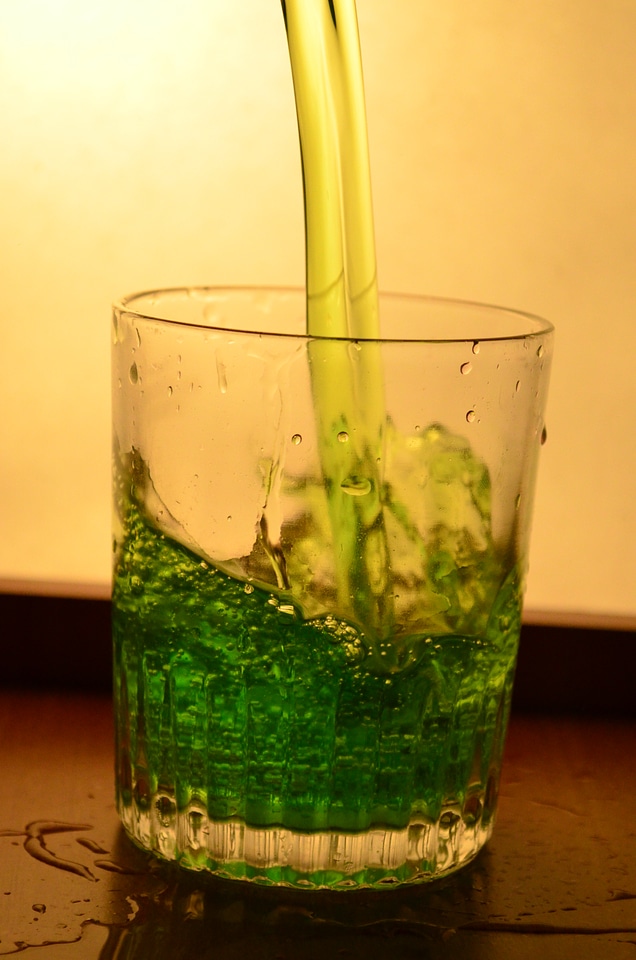 Glass Of Greenish Liquid