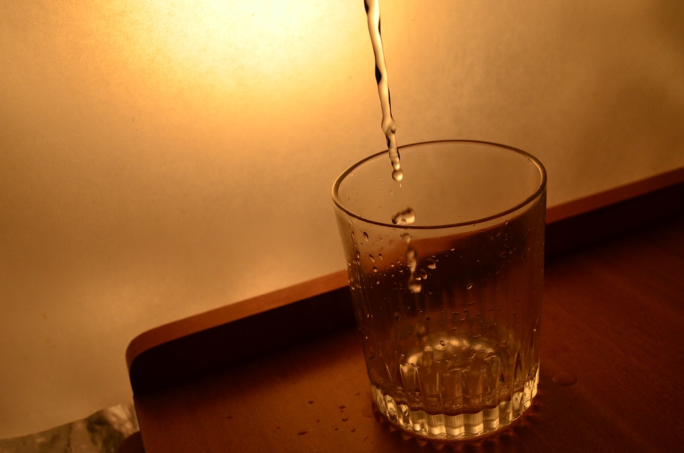 Water Pouring In Glass