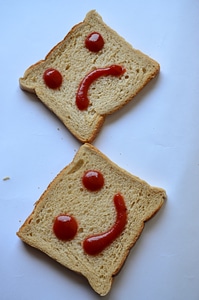 Happy Sad Smiley In Bread photo