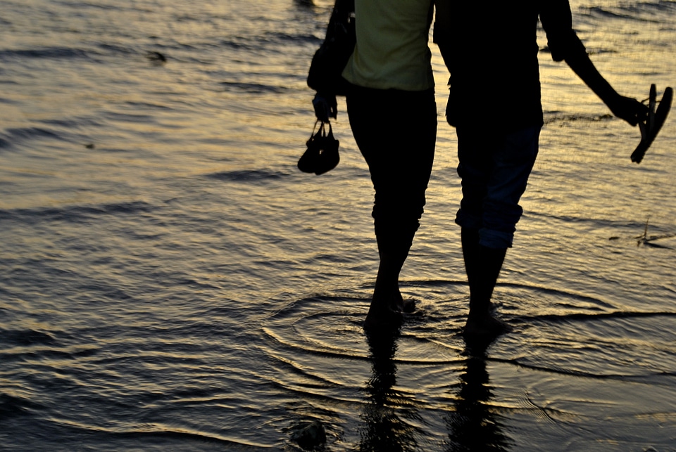 Couple Walking Waves