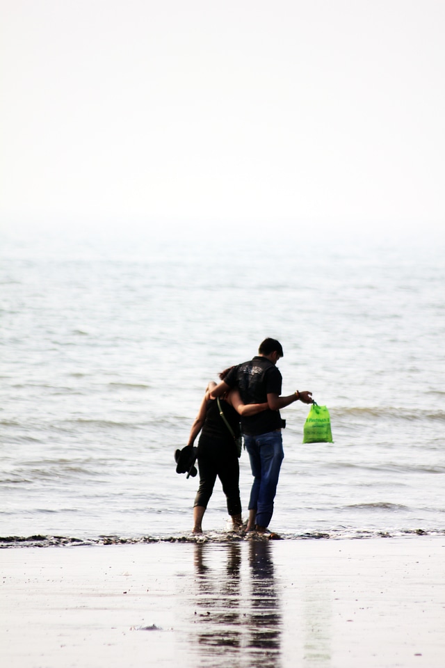 Couple Walking Beach