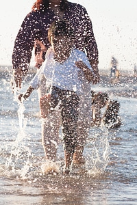 Child Playing In Water
