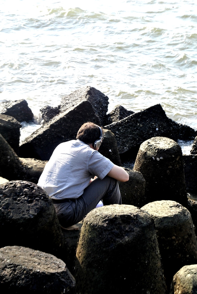 Man Headphones Sitting photo