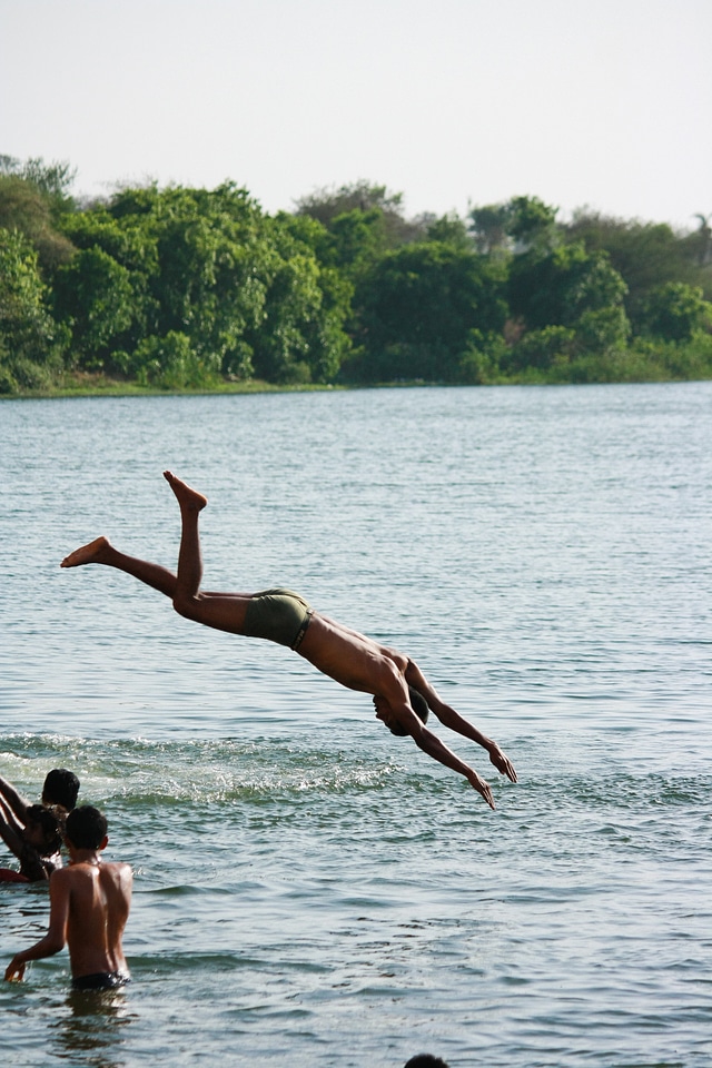 Man Diving In Water