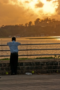 Man Standing Alone Thinking photo