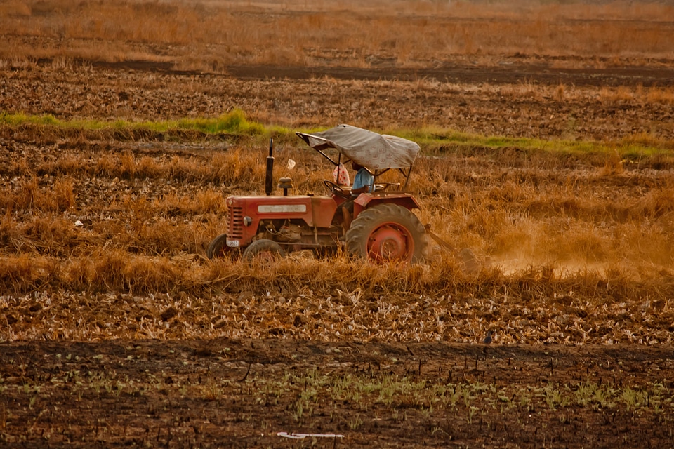 Tractor Tilling Farms