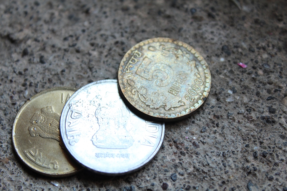 Indian Coins On Stone