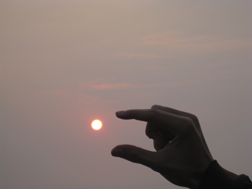 Sun Within Fingers Hands