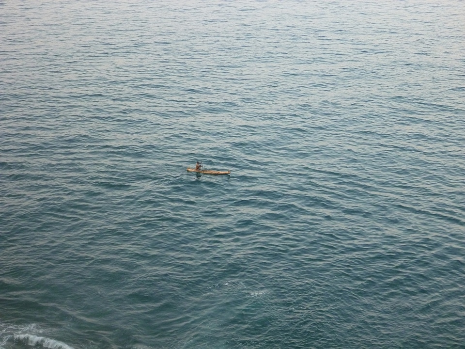 Fisherman On Boat Sea photo