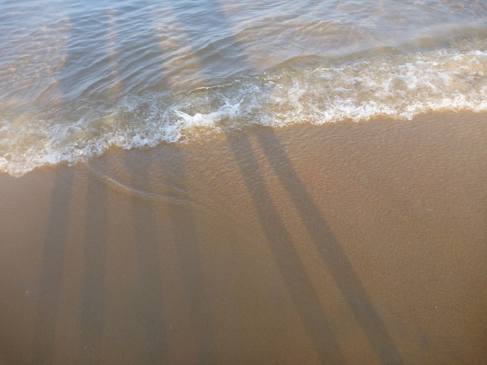 Shadow Of People On Beach photo