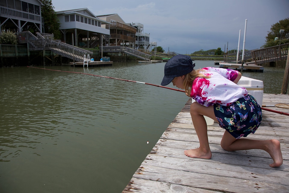Girl checking for fish