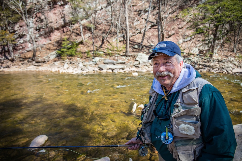 Fisherman fly fishing 