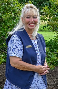 FWS Volunteer in flower garden