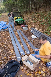 Refuge volunteers build animal crossing structure