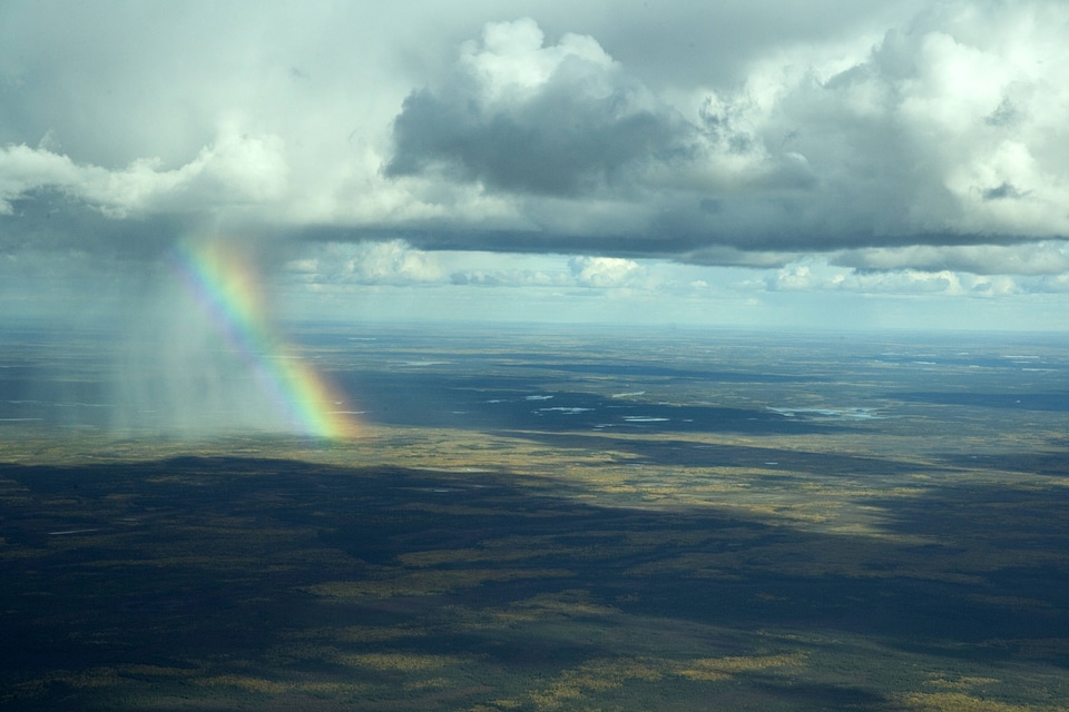 Rainbow shining down on Yukon Flats National Wildlife Refuge
