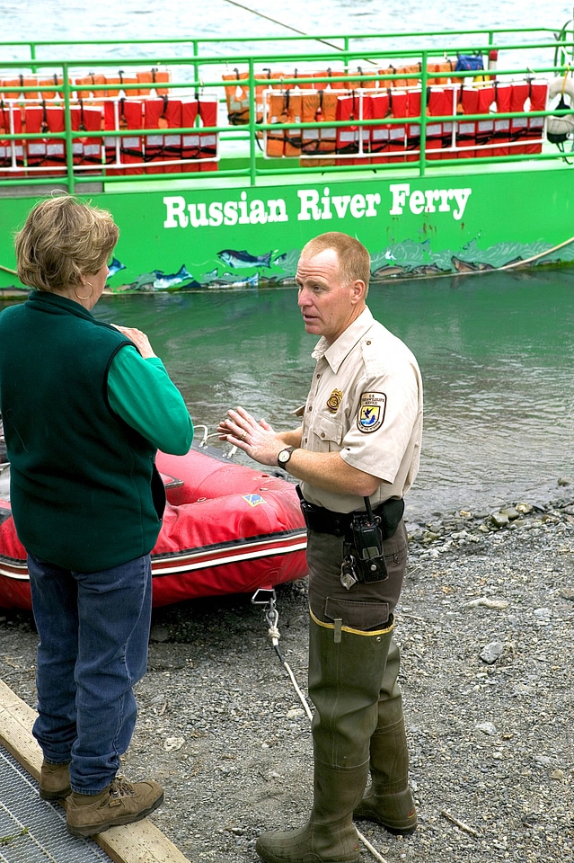 Law enforcement officer communicates with a visitor