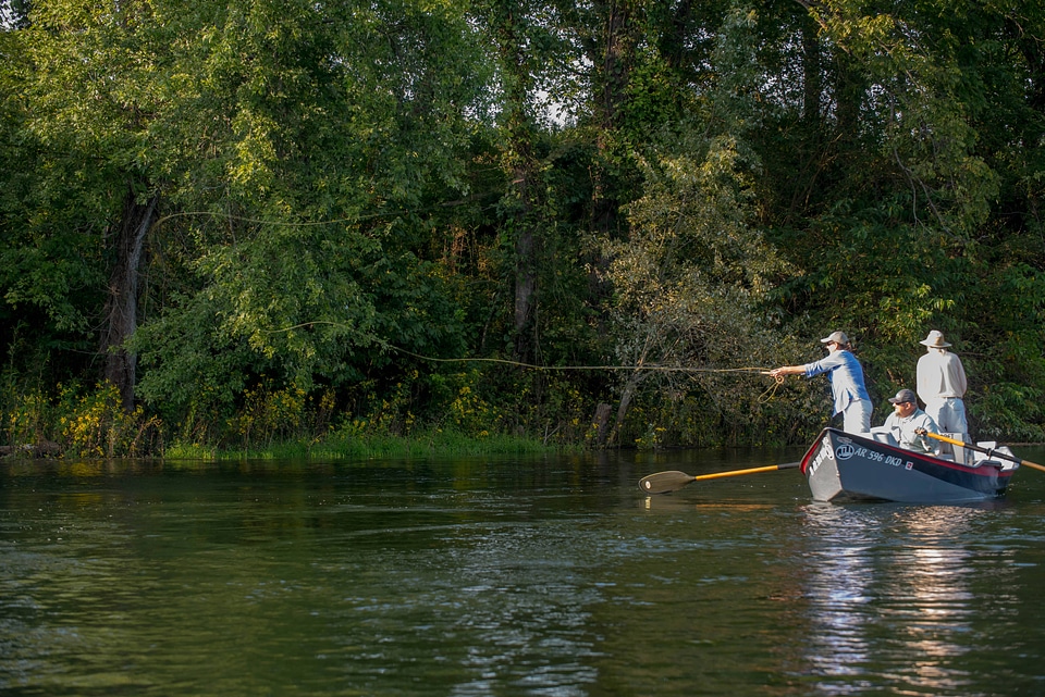 Group fly fishing from drift boat on White River-1