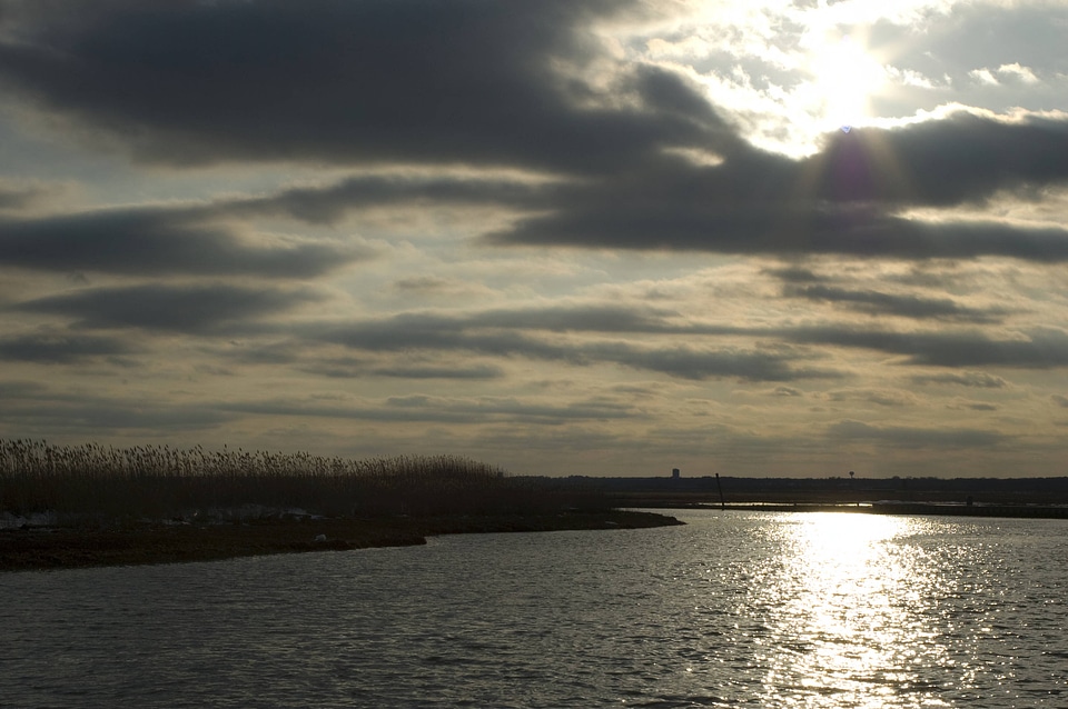 Sunburst on coastline