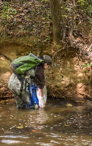 FWS mussel biologist, Morgan Wolf, releases endangered Carolina Heelsplitter