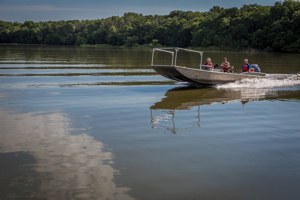 Fisheries biologist searching for invasive carp on the Illinois River