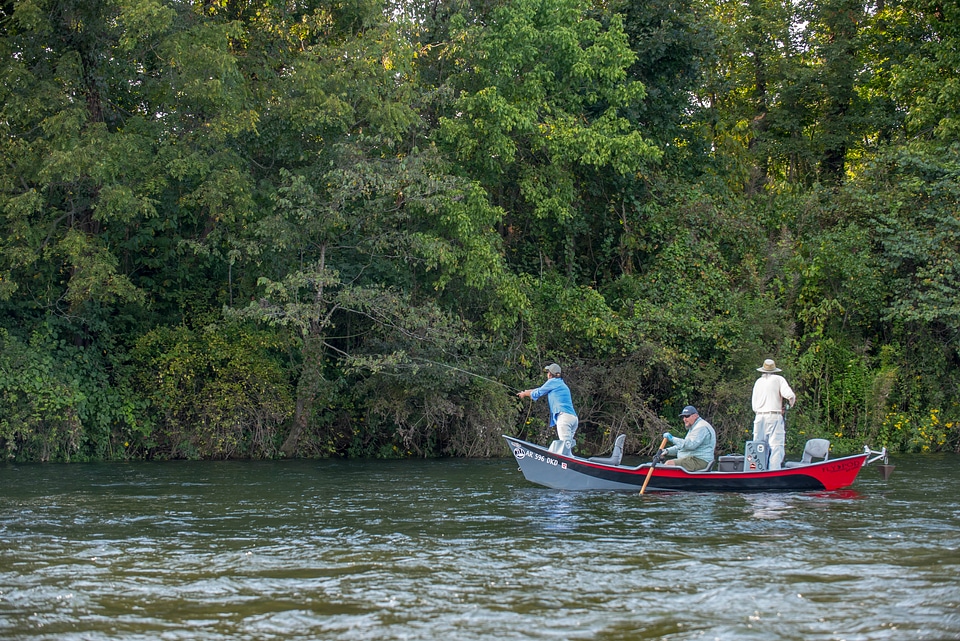 Group fly fishing from drift boat on White River-1 photo