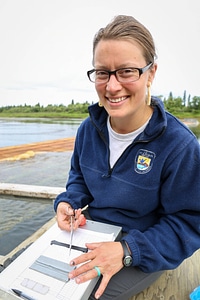 Biologists sample pacific salmon photo